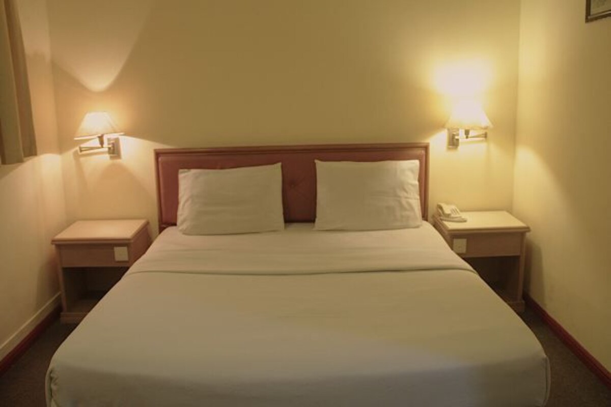 Desk, laptop workspace, free WiFi, bed sheets