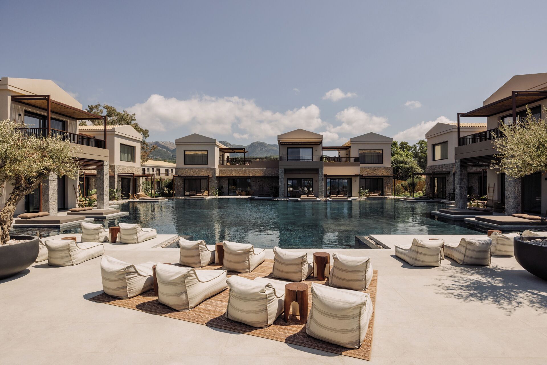 4 outdoor pools, open 10:00 AM to 6:00 PM, pool umbrellas, pool loungers