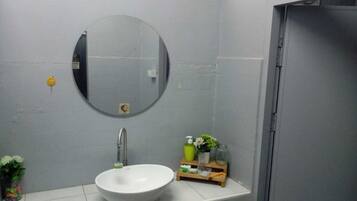 Shower, towels, soap, toilet paper