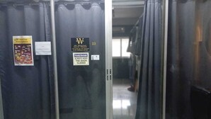 A hotel room with a sliding door, a sign for room 23, and a 'Friendly Reminder: Always Keep the Door Closed' sign. - Butlers WDH (Bangkok)