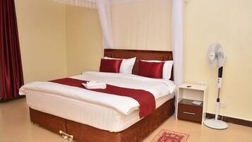 Executive appartement, 2 slaapkamers, patio | 2 slaapkamers, een kluis op de kamer, individueel gedecoreerd