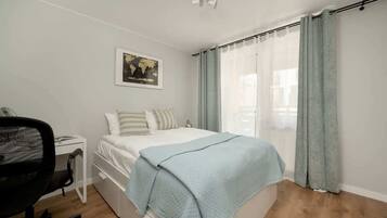 1 bedroom, desk, iron/ironing board, travel crib