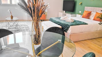 Luxury Studio Suite, City View | Down duvets, pillow-top beds, in-room safe, blackout curtains