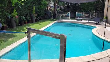 Seasonal outdoor pool, sun loungers