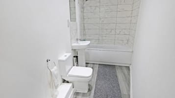 Deep soaking tub, towels