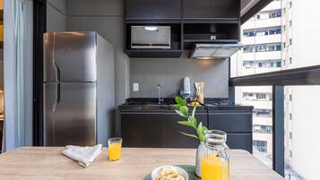 Comfort Studio | Private kitchen | Full-size fridge, microwave, stovetop, coffee/tea maker