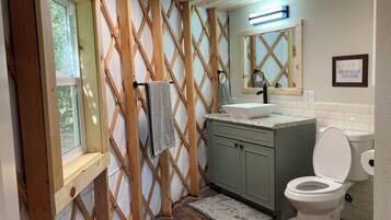 Shower, towels, soap, toilet paper