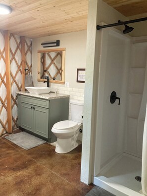 Shower, towels, soap, toilet paper