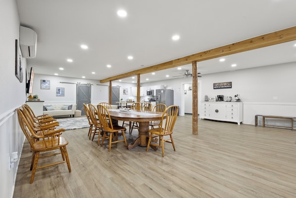 Enjoy meals in this well-appointed dining area with a large table and matching chairs.