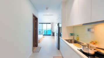 Panoramic Studio, Balcony, Ocean View | In-room safe, desk, laptop workspace, blackout drapes