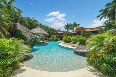 2BR Condo steps from the beach!