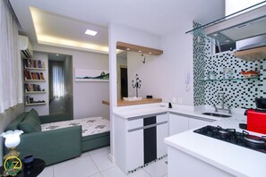 Microwave, coffee/tea maker, toaster, cookware/dishes/utensils