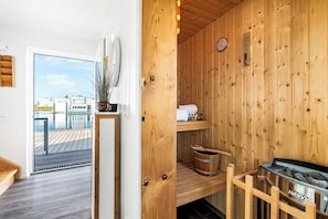Sauna - Water house "Aloha" on the Baltic Sea: with roof terrace and sauna - dogs welcome (Olpenitz)