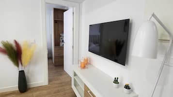 Comfort Apartment, City View | Living area | TV