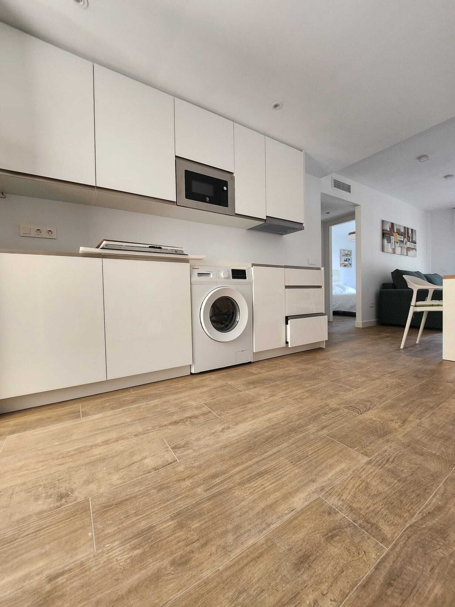 Comfort Apartment, City View | Private kitchen | Full-sized fridge, microwave, stovetop, dishwasher