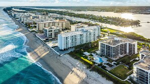 A coastal hotel with multiple high-rise buildings, a beachfront, and a marina. - Palm Beach Island Seasonal Rental 6 month required 
Oceanfront 2 bed 2 bath  (Palm Beach)