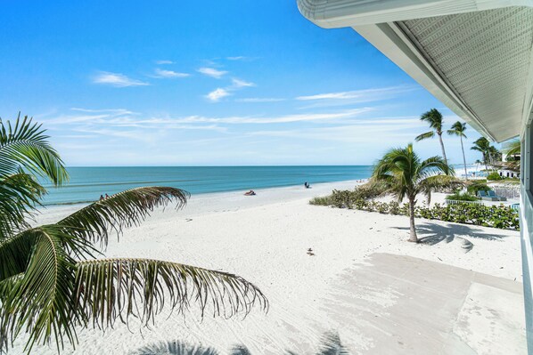 On the beach, sun loungers, beach towels - Sunset Gulf-Front Luxury – 4BR/4.5BA+Loft, Remodeled, Elevator & Beach Access (Bonita Springs)