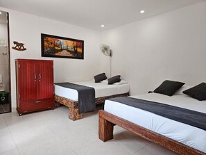 Family Quadruple Room | Iron/ironing board, free WiFi - Hosteria La Medusa (Cocorná)