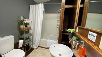 Hair dryer, towels, soap, toilet paper