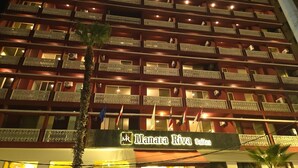 A multi-story hotel with balconies and a sign reading "Manara Riva Suites". - Manara Riva Suites  (Beirut)