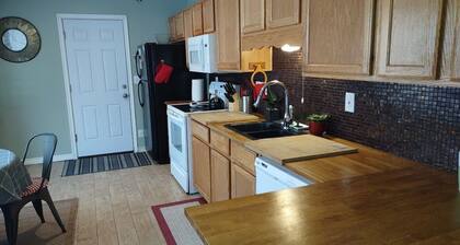 Charming 3 bed/2 bath condo with Central AC/Heat & 2 car garage.