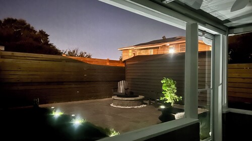 Charming guesthouse with private backyard just 3 doors down from New Orleans.