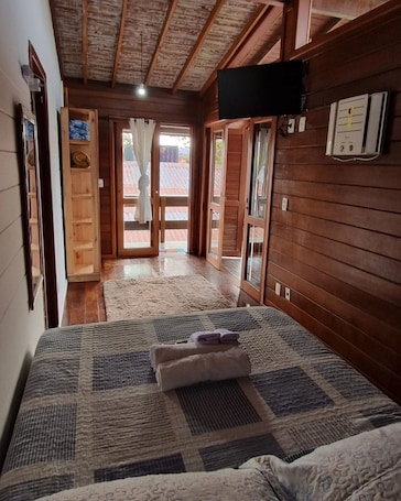 Comfort Suite | 1 bedroom, minibar, free WiFi, bed sheets. Suli Pousada