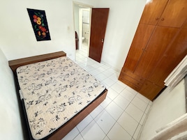 Apartamento família | Ferros/tábuas de passar roupa, Wi-Fi de cortesia