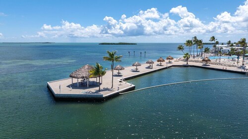 Canal Front Retreat w/ Ocean Views, 35' Dock & Golf Cart Option