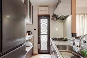 Family Apartment (with Balcony) No Cleaning Service Eco, Non Smoking | Private kitchen | Full-size fridge, microwave, stovetop, electric kettle - toukyouryokan-takasago (Tokyo)