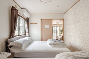 Family Apartment (with Balcony) No Cleaning Service Eco, Non Smoking | 2 bedrooms, in-room safe, desk, laptop workspace