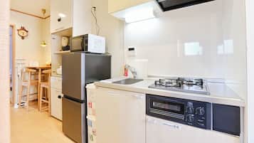 Family Apartment (with Balcony) No Cleaning Service Eco, Non Smoking, Up to 4 Guests | Private kitchen | Full-sized fridge, microwave, stovetop, electric kettle