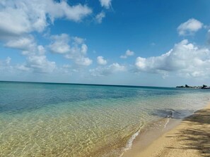 Na praia, toalhas de praia
