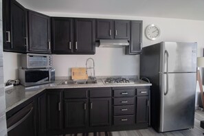 Fridge, microwave, dishwasher, coffee/tea maker