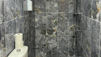 Shower, towels, soap, shampoo