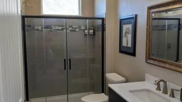 Shower, towels, soap, shampoo