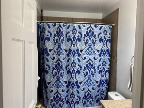 Hair dryer, towels, soap, shampoo