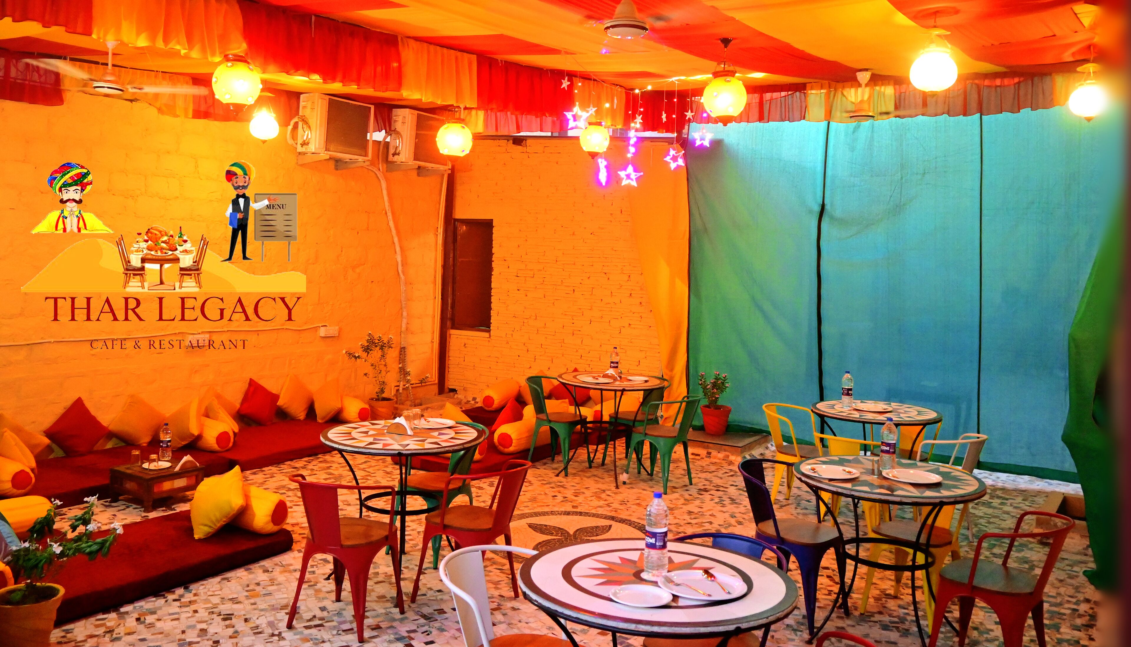 A cozy restaurant interior with a brick wall, colorful cushions, and a variety of seating options including round tables and chairs.