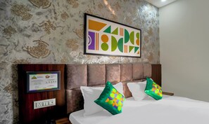 Desk, blackout curtains, iron/ironing board, bed sheets - Treebo NPS Grand (Ranchi)