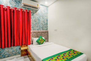 Economy Double Room | Desk, blackout drapes, iron/ironing board, bed sheets - Treebo NPS Grand (Ranchi)