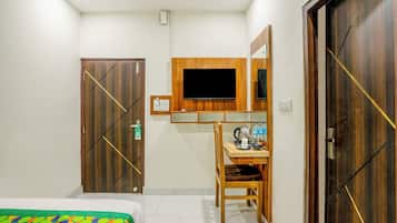 Economy Double Room | Desk, blackout curtains, iron/ironing board, bed sheets