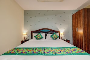 Desk, blackout curtains, iron/ironing board, bed sheets