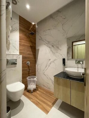 Shower, free toiletries, hair dryer, bathrobes