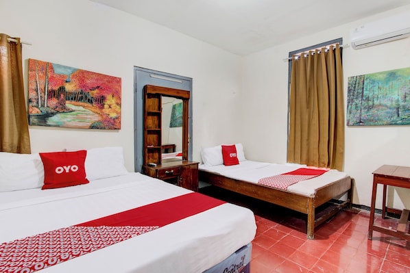Economy Single Room | Free WiFi, bed sheets - Hotel O Homestay Alqid Syariah (Yogyakarta)