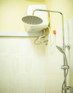 Shower, towels, soap, toilet paper