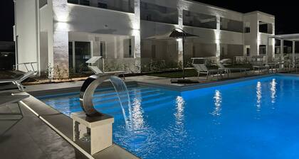 Accoglienti appartamenti dallo stile moderno ed elegante con vista piscina.