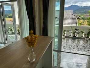 Marigold suites Room with Mountain View | Down comforters, minibar, desk, laptop workspace - Garden House Rice Field and Mountain View (Luang Prabang)