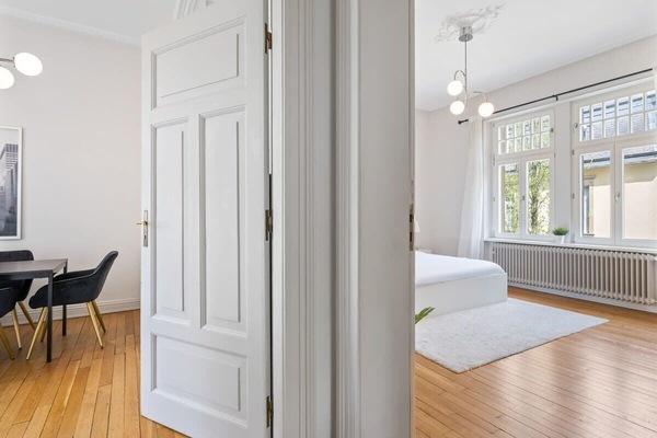 Open and inviting layout with elegant details and plenty of natural light, creating a warm and welcoming atmosphere.