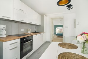 Apartment, 2 Bedrooms, Kitchen | Private kitchen | Microwave, coffee/tea maker, dining tables - Apartment Close to Old Town by Renters (Poznan)