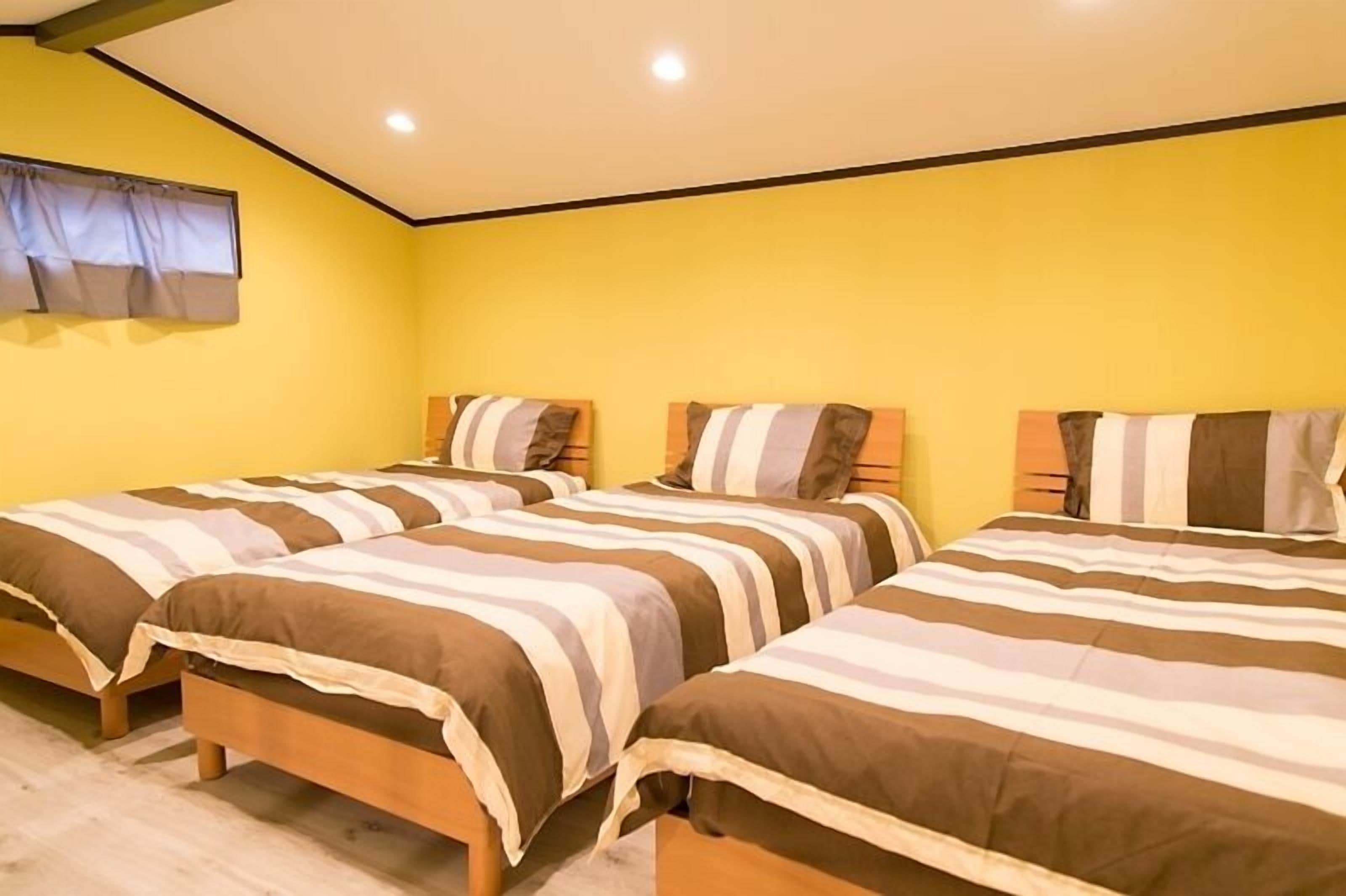 Room, Multiple Beds, Non Smoking, Private Bathroom | Free WiFi